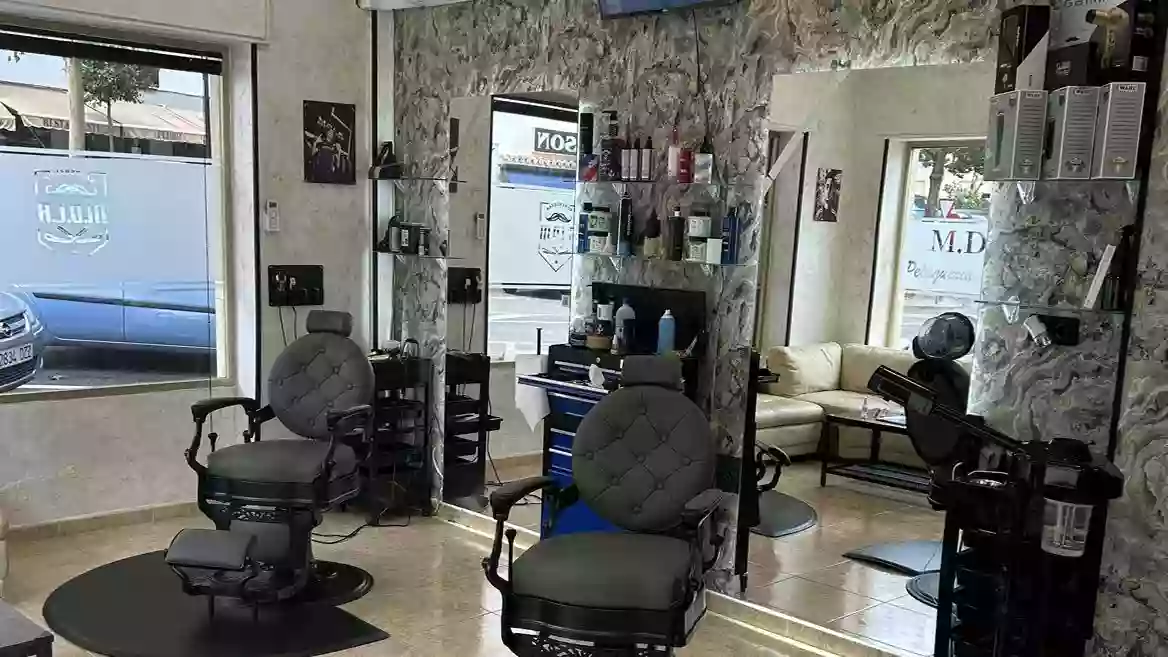 BARBERÍA M.D.L.R