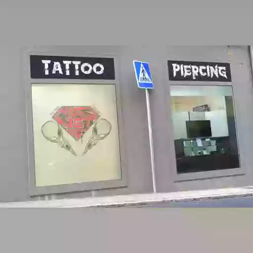 Meet Tattoo Piercing