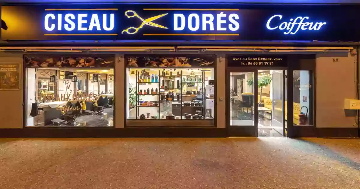 Ciseaux dorés coiffeur